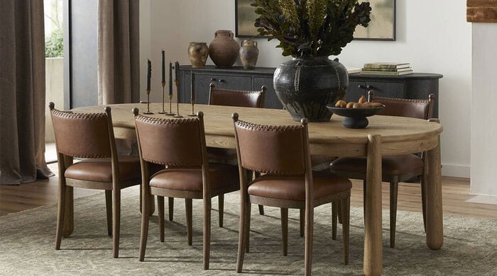 Modern living space with two white couches and a light gray coffee table